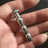 Dilatador de pene de metal largo